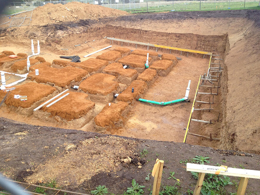 Footings prepared for concrete slab foundation Footings and trenches prepared for house slab