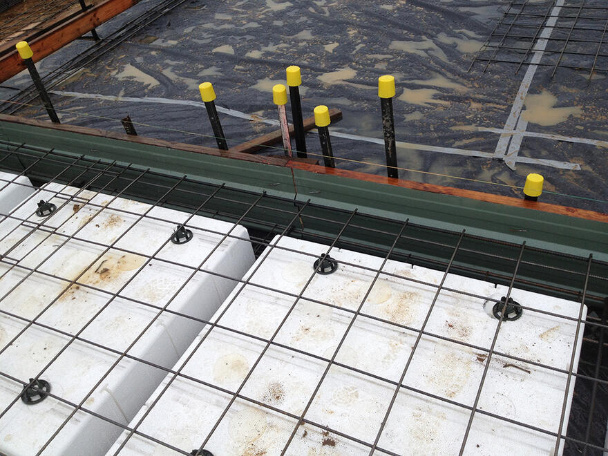 Waffle pod slab installation Waffle pod house slab with steel reinforcement under construction in Melbourne